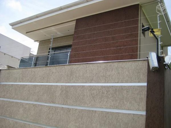 Fachada com efeito grafiato em duas cores